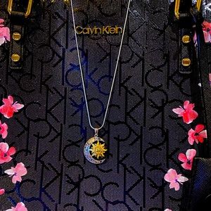 Two tone moon and sun necklace